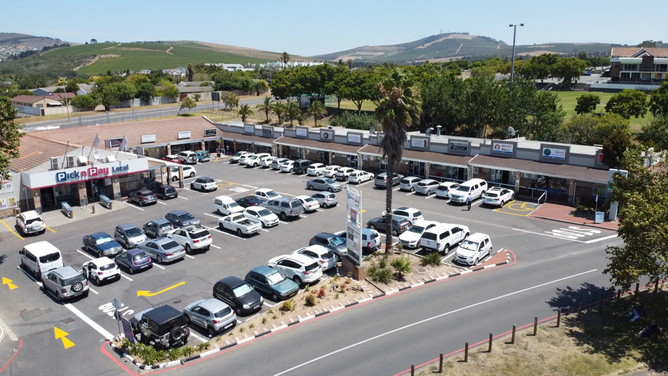 Aerial view of Ipic Shopping Centre Kenridge: the Pick n Pay Local and the strip of shops around the parking court off Doordekraal Road.